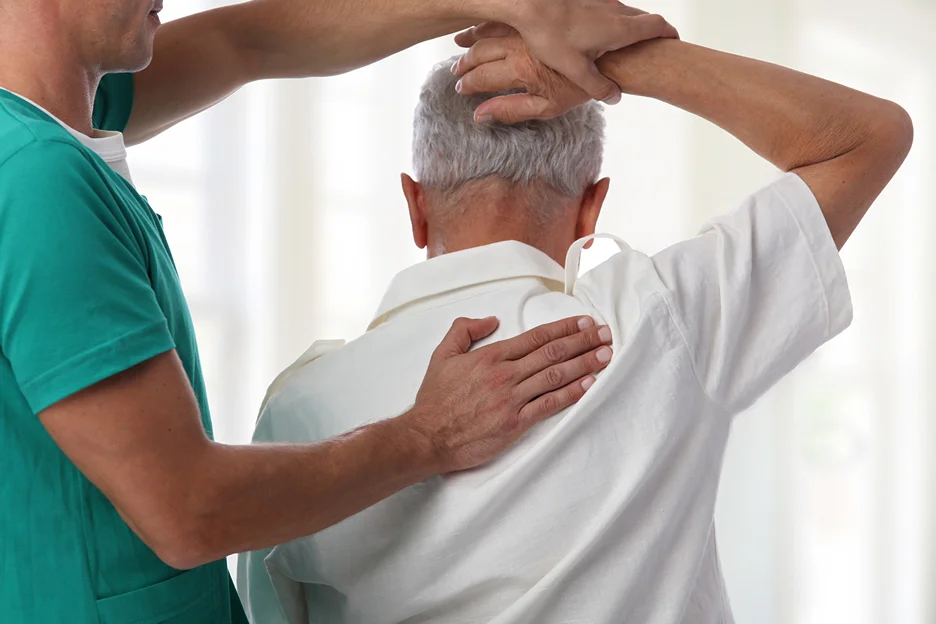 doctor and patient consultation for upper back pain
